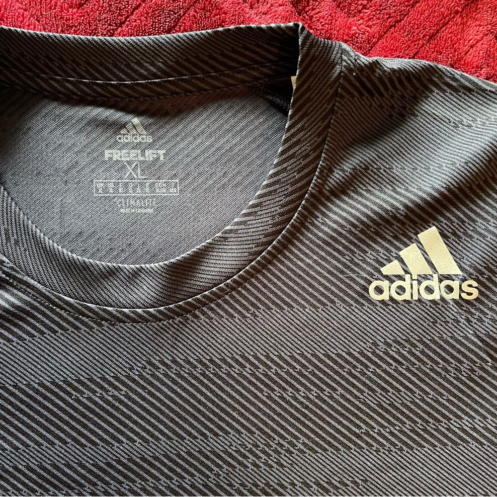 Adidas Freelift Tennis T-Shirt.  Dark Blue/Black W/ Grey Adidas Logo. Size Xl.